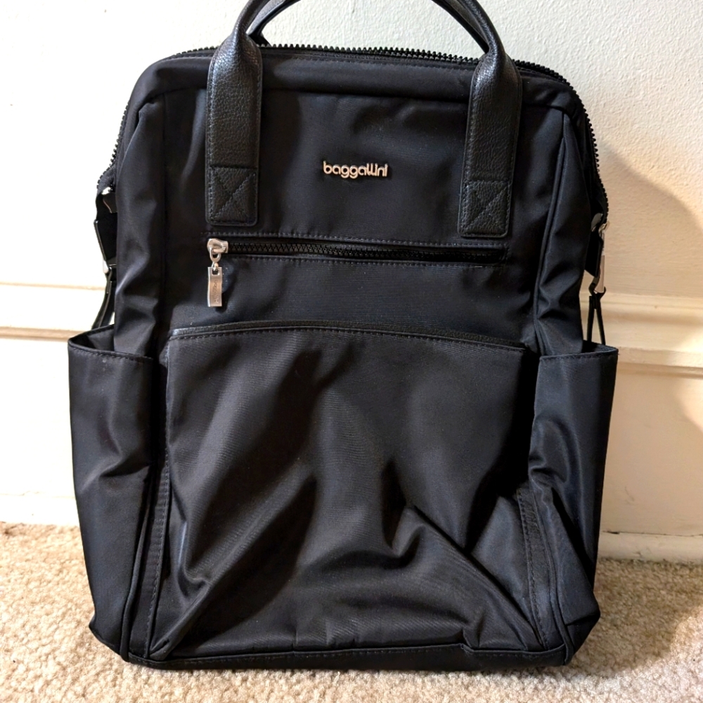 Baggalini Soho black travel backpack with compartments